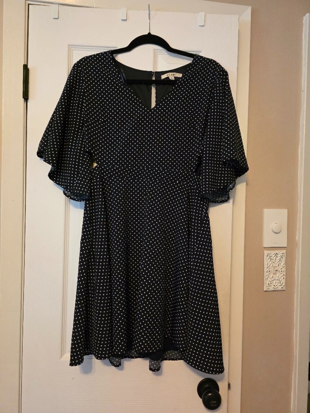 Francesca's retro navy polka dot dress